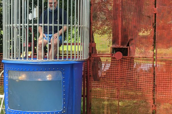 PD&C’s Simon Yendle is set for his turn in the Dunking Booth. Photo: Laurie Hanson