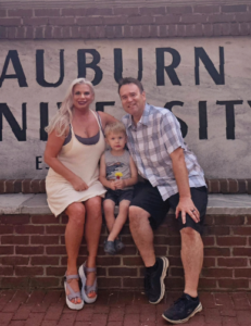 Kyle Cordie with his wife and child.