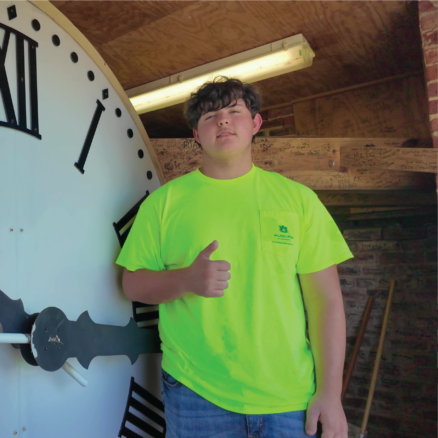 Brayden Bryant infront of Samford Clock Face.